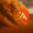 A large Electronic Arts logo being subsumed by a massive desert sandstorm.